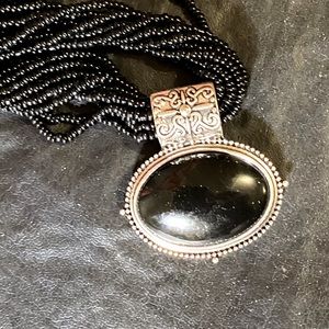 Multi-strand , Black Glass Seed Bead Necklace with pendant.